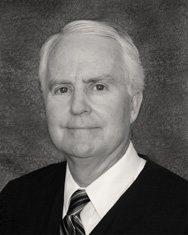 Justice Stephen Kane was born in San Mateo in 1952. He and his wife Brenda have four children. - 5DCA-Kane-188x235
