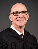 Justice Frank J. Menetrez
